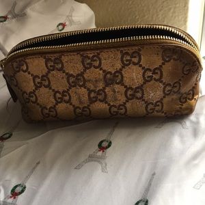 Gucci limited edition gold unicef cosmetics case